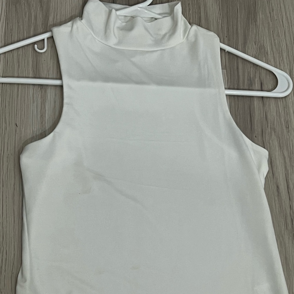Stella Tweed Sleeveless Turtleneck